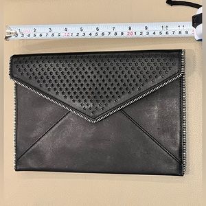 Gently used Rebecca Minkoff black envelope clutch with zipper detail